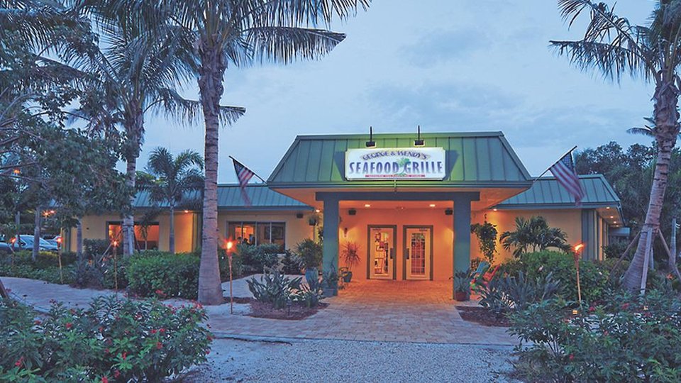 Restaurant exterior with outdoor seating on Sanibel.