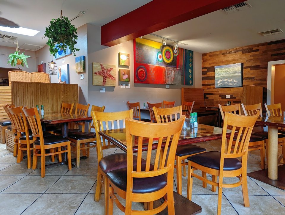 Sports bar interior with taps and warm lighting.